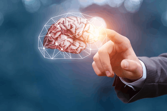 Üzletember kézzel digitális agymodellt érint meg, a neuroalapú szervezetfejlesztés szimbólumaként